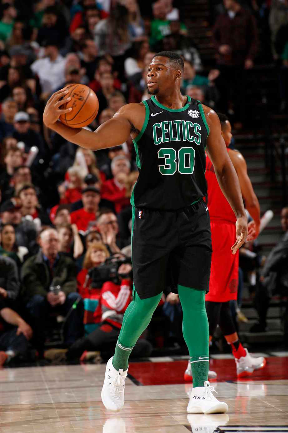 Boston Celtics forward Guerschon Yabusele faces reporters at NBA