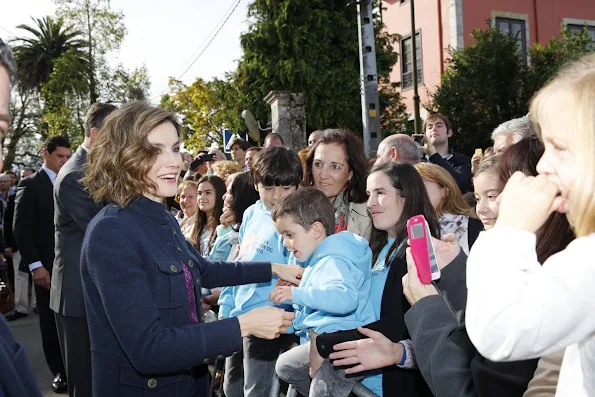 King Felipe and Queen Letizia visit Colombres, Asturias, Spain Queen Letizia wore Hugo Boss Trouser - pant, wore carolina herrera blouse, tous earrings