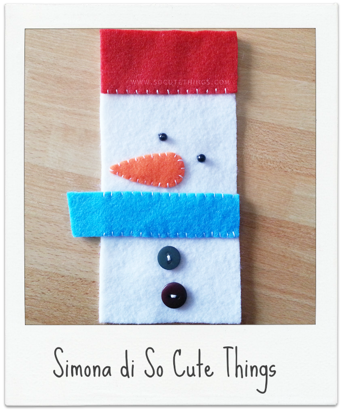 http://www.socutethings.com/2014/12/Handmade-Christmas-felt-xmas-tags.html#.VIKa-skhBFt