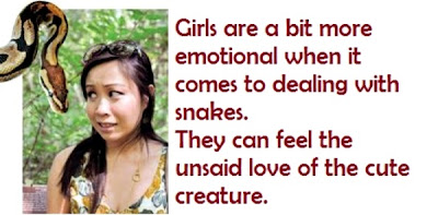 Snake Hanging In Front Of A Girl