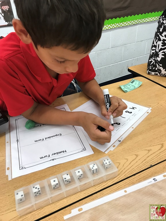 An Apple For The Teacher Using a Pill Box and Dice to Practice Place Value