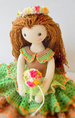 Crochet amigurumi doll in beautiful dress