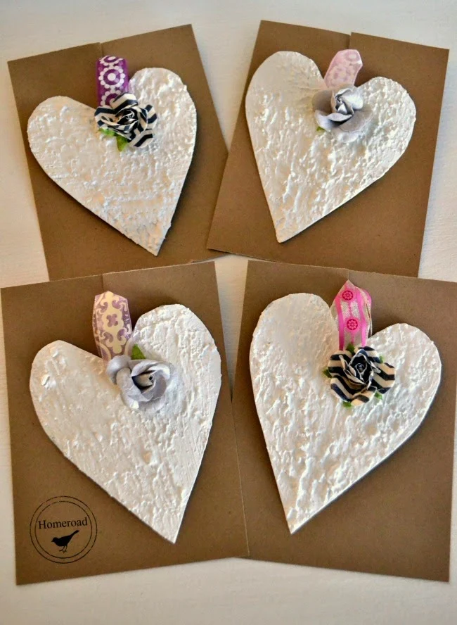 Textured paint tin hearts for Valentine's Day www.homeroad.net