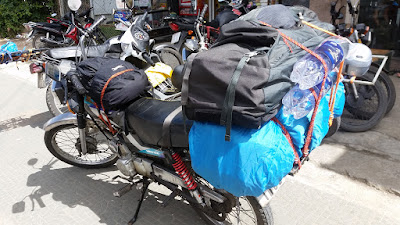 A motorcycle loaded with two backpacks for a ride from Dalat to NHA Trang, Vietnam.