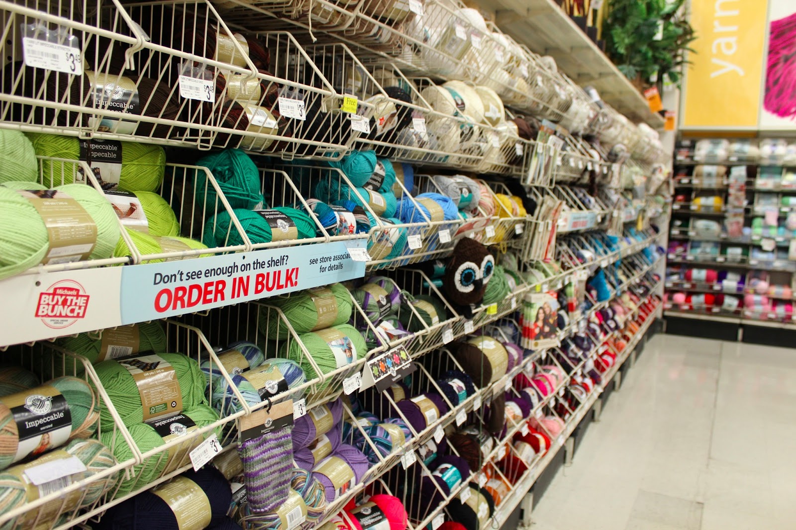 южный магазин рукоделия. отдел вышивки в магазине. южный магазин рукоделия. южный магазин рукоделия. оформление магазина для творчества.