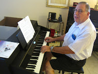 Senior Citizen play digital piano