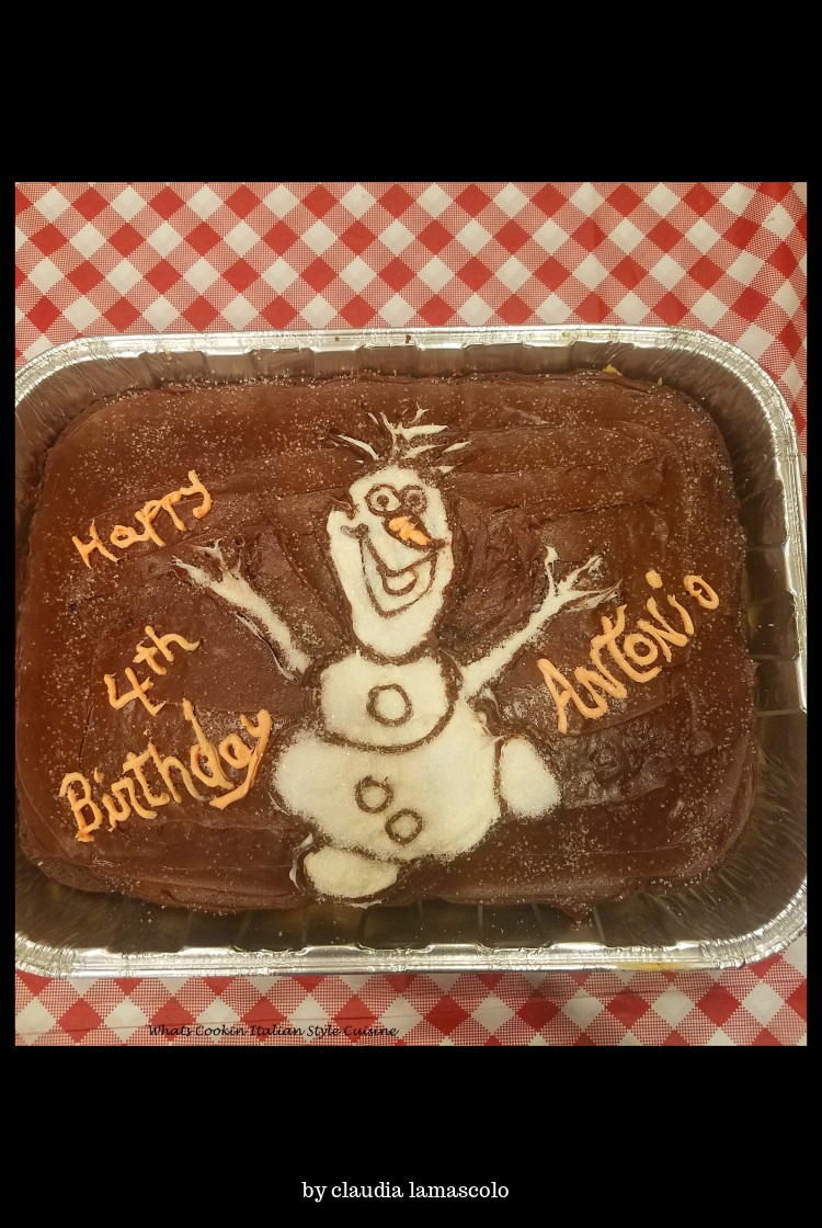 Olaf on the chocolate frosted cake