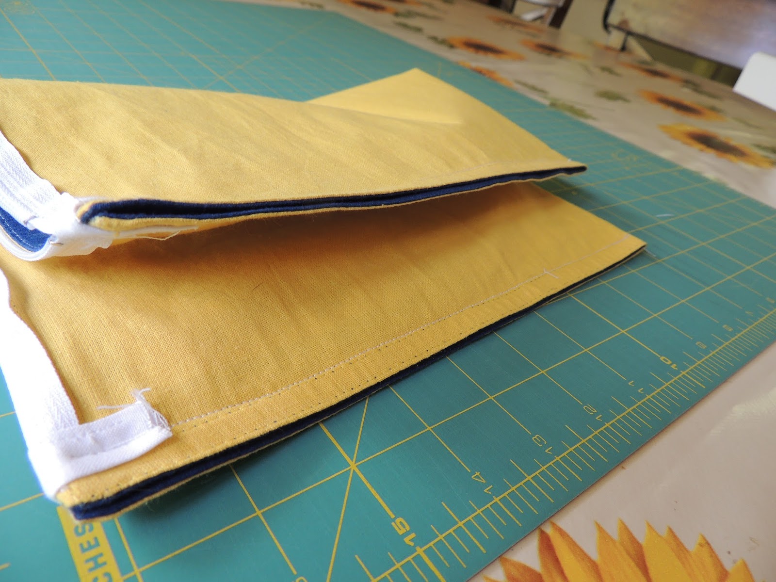 sing. read. sew. travel. teach. Placemat to Zipper Pouch