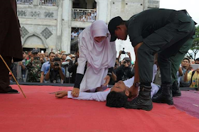 After caning for breaking Islamic law in Indonesia, Man collapses