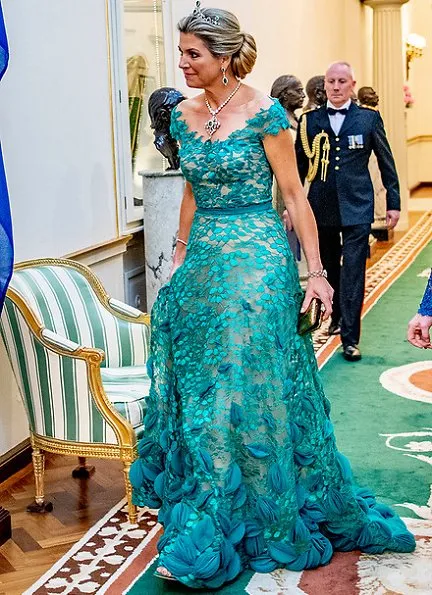 Queen Maxima wore a green lace gown by Jan Taminiau. Lace dress by Dutch designer Jan Taminiau. Green diamond earrings, tiara, necklace