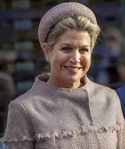 Queen Maxima wore a belted coat dress by Claes Iversen, and hat. Hans Boodt Mannequins in collaboration with Claes Iversen
