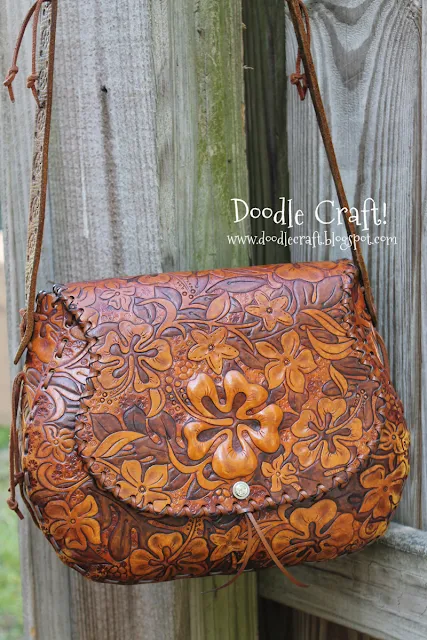 http://www.doodlecraftblog.com/2012/09/hawaiian-hibiscus-leather-purse.html
