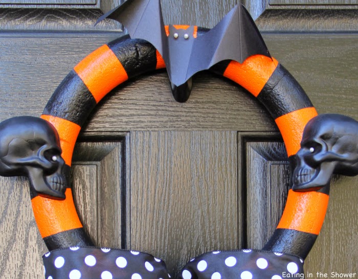 Spray Painted Styrofoam Orange and Black Striped Halloween Wreath With Skeletons and Bats