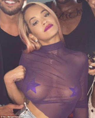 3 Braless Rita Ora shows off her perky breasts in see through top