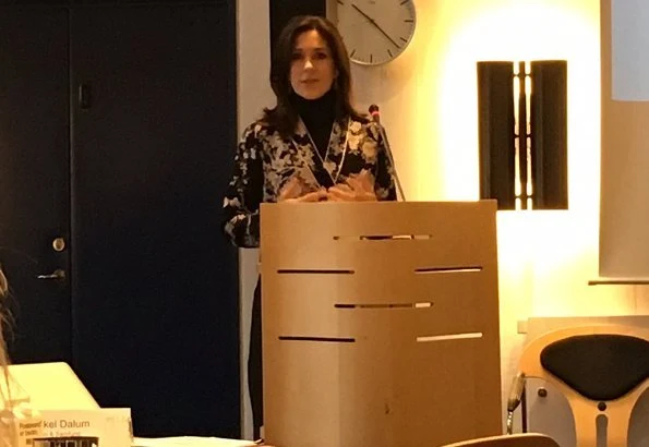 Responsibility and bottom line: Gender equality and women's health for businesses and investors. Crown Princess wore a floral print v-neck blouse