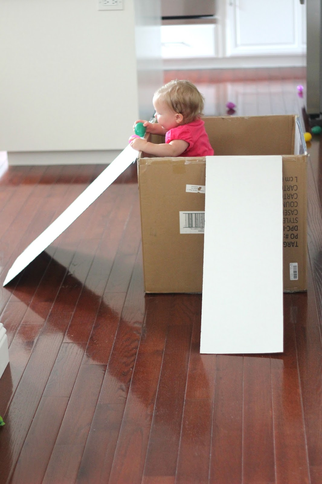 Toddler Approved! Easy Cardboard Box Egg Roll for Toddlers