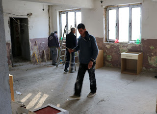 Clearing away so the walls can be scraped clean Clearing away so the walls can be scraped clean
