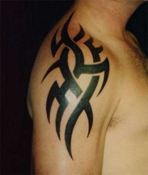 star tattoo on forearm. tribal star tattoo for men.