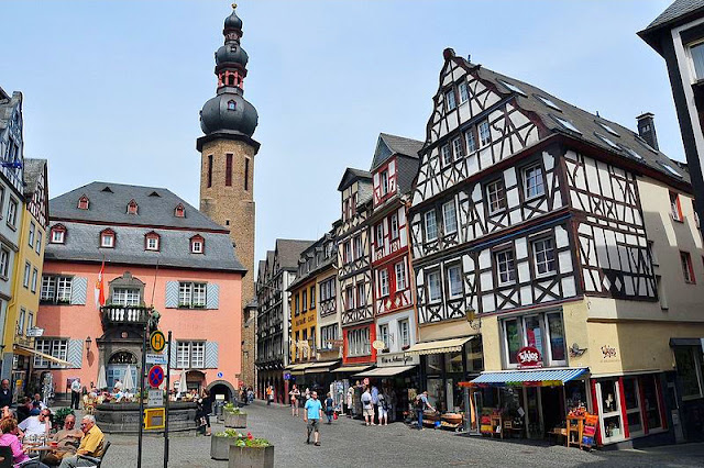 Medieval half-timbered architecture of the village square in Cochem, Germany.