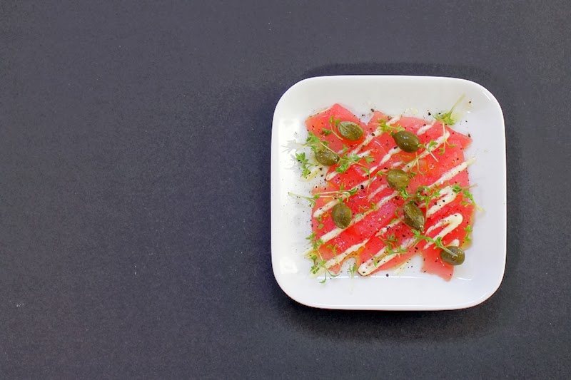 Delicious Tapas Tuna carpaccio with capers & cress 130