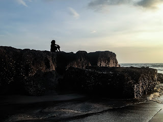 Calm The Mind On Sea Rocks In The Sunset Light At Batu Bolong Beach, Canggu Village, Badung, Bali, Indonesia