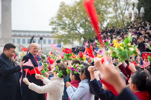 Image Attribute: President Donald J. Trump and President Xi Jinping meet children waving Chinese and U.S. flags at welcoming ceremonies outside the Great Hall of the People, Thursday, November 9, 2017, in Beijing, People’s Republic of China. (Official White House Photo by Shealah Craighead)