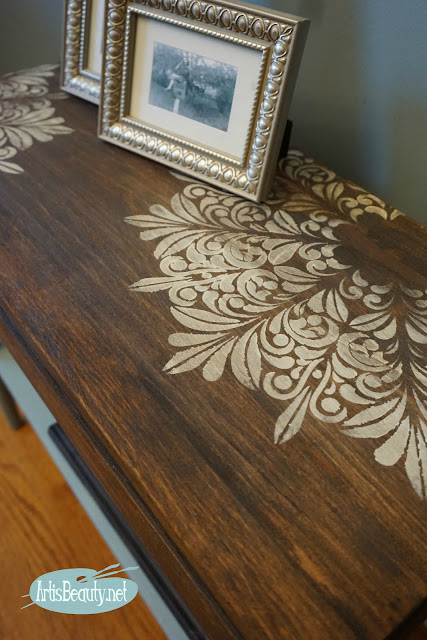 fluer medallion stencil in snow white over dark stained wood before and after