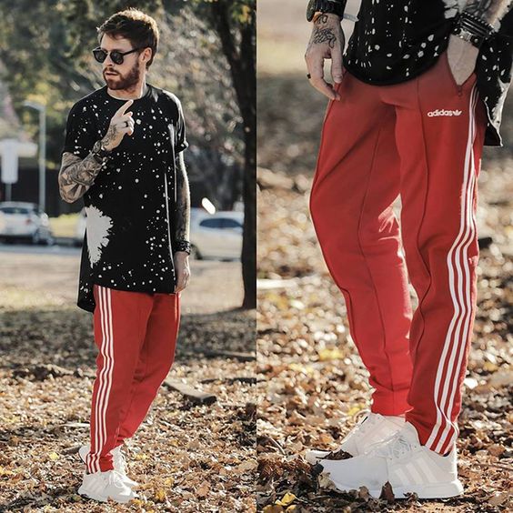 calça preta com listra vermelha masculina