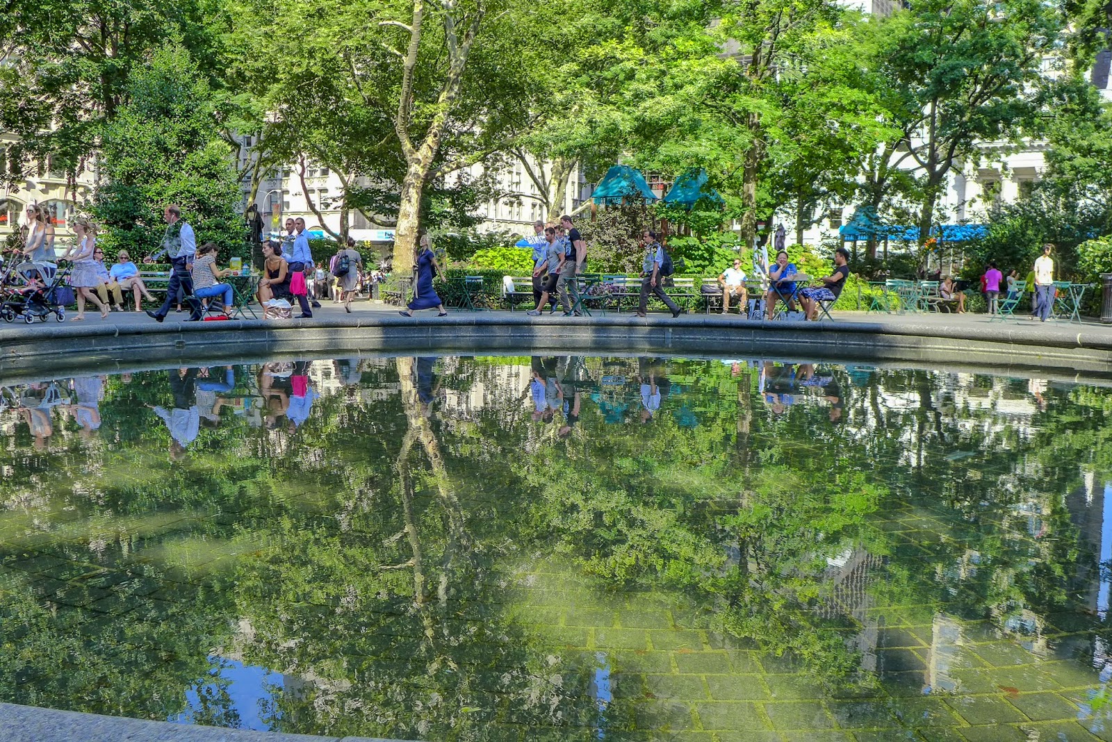 NYC, Madison Square Park, people and reflecting pool