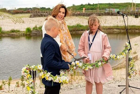 Crown Princess Mary wore Chanel black and cream espadrilles flats. Princess wore an ivory blazer and navy trousers