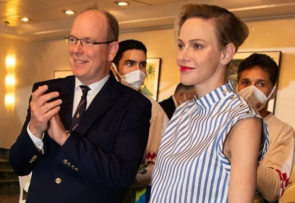 Princess Charlene wore Louis Vuitton sleeveless top with button detail. Princess Gabriella. sleeveless blouse by Louis Vuitton
