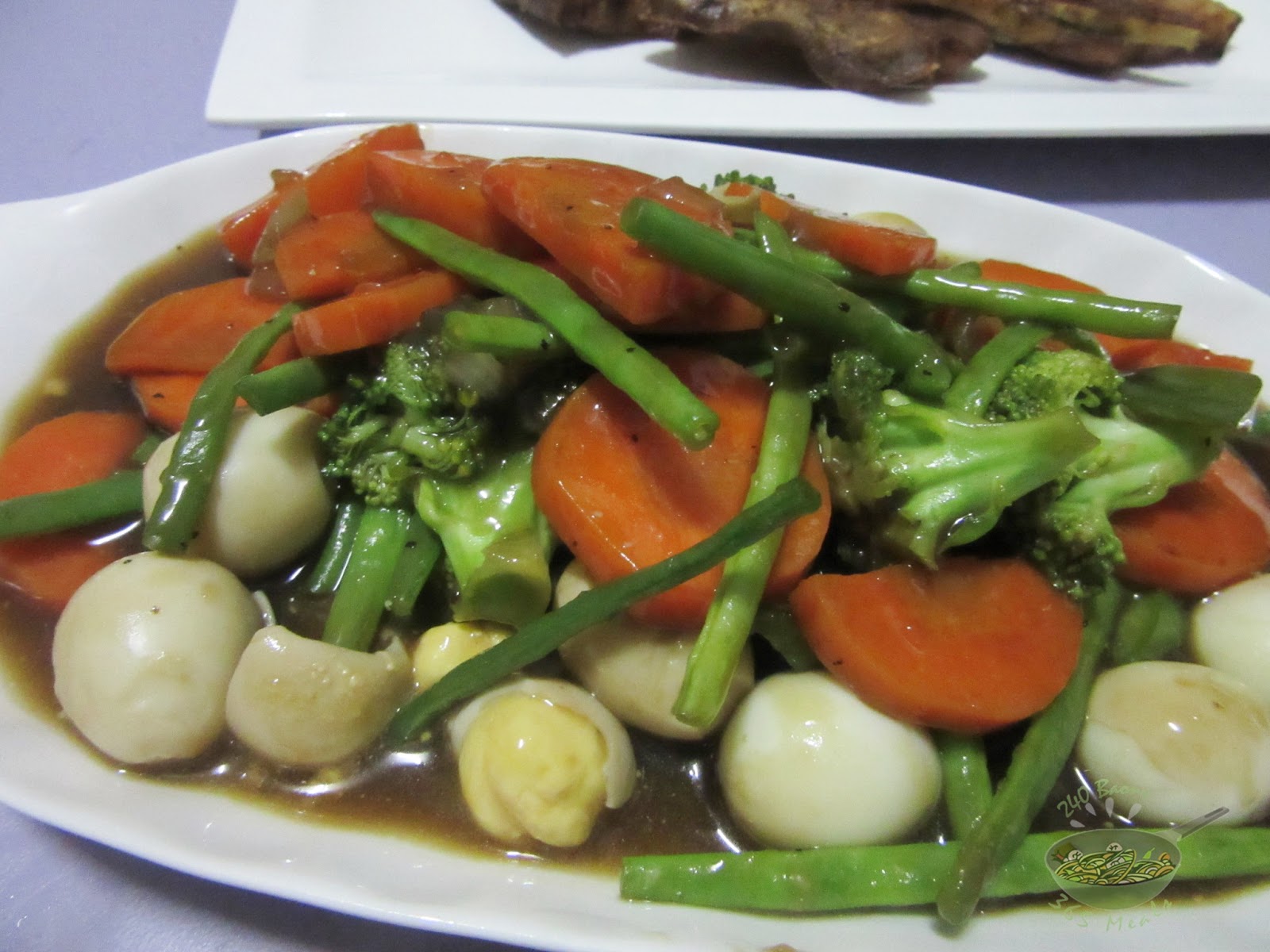 Stir Fried Vegetables with Quail Eggs in Oyster Sauce