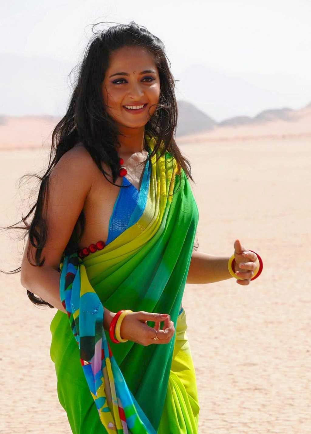 Anushka Shetty In Green Saree Hot Stills