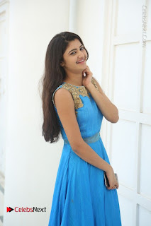 Telugu Actress Akshita (Pallavi Naidu) Latest Stills in Blue Long Dress at Inkenti Nuvve Cheppu Movie Promotions  0025