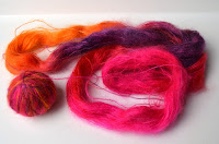 Silk mohair yarn: Alchemy 'Haiku' in 'Air and Fire' colour - a mix of rich orange, purple and hot pinks and fiery red.