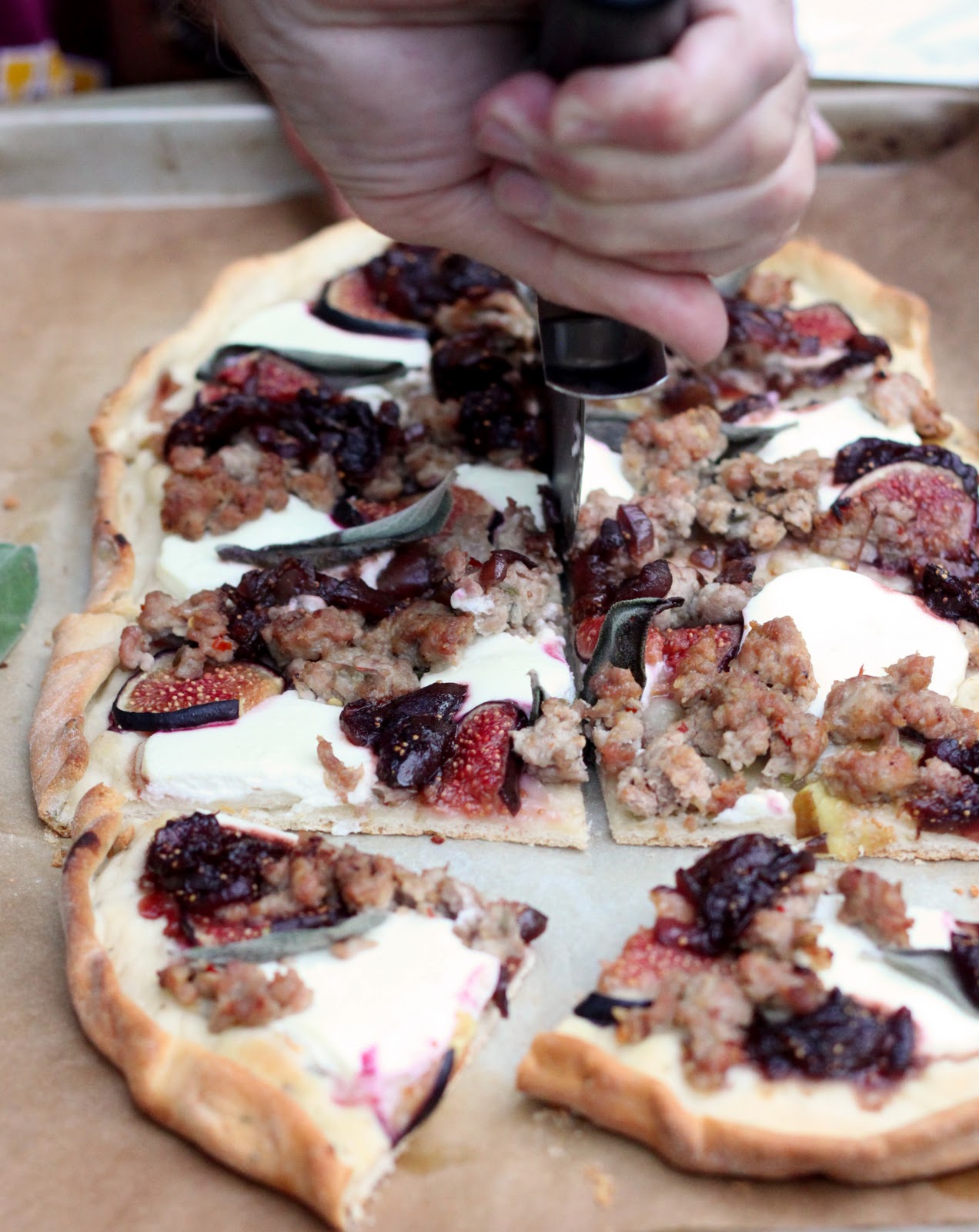 The Cilantropist Sausage and Goat Cheese Pizza, with Balsamic Onions