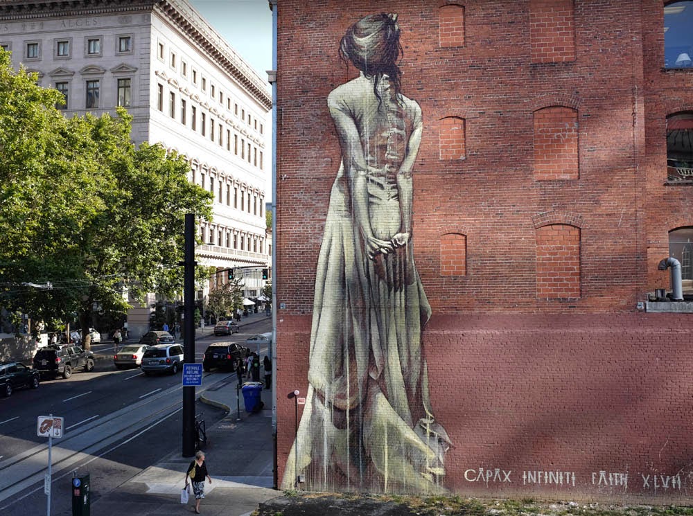 After a series of pieces in Durban, South Africa, Faith47 is now in North America where she just wrapped up this new mural for the Forest For The Trees project.