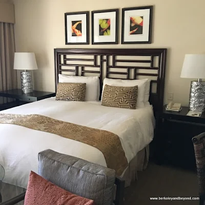 guest room bed at Tradewinds Carmel in Carmel, California