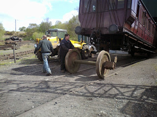 Reprofiled wheelset being replaced under Ex-MS&L carriage No.8