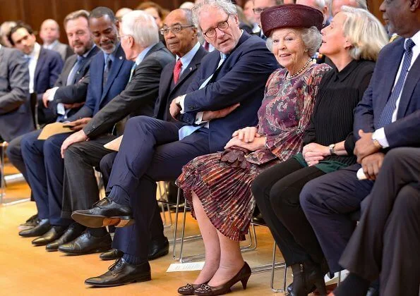 Princess Beatrix attended a symposium held on the occasion of Kingdom Day at the Council of State in The Hague