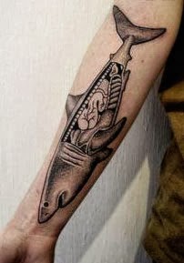 Tatuagens de tubarão no braço