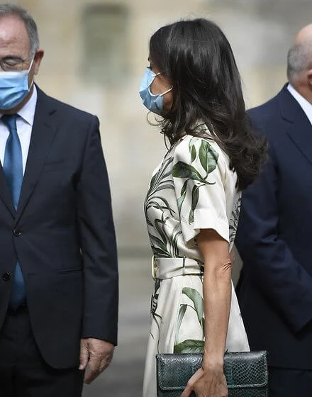 Queen Letizia wore a new printed shirt dress from Pedro del Hierro, and nude patent leather slingback pumps from Carolina Herrera