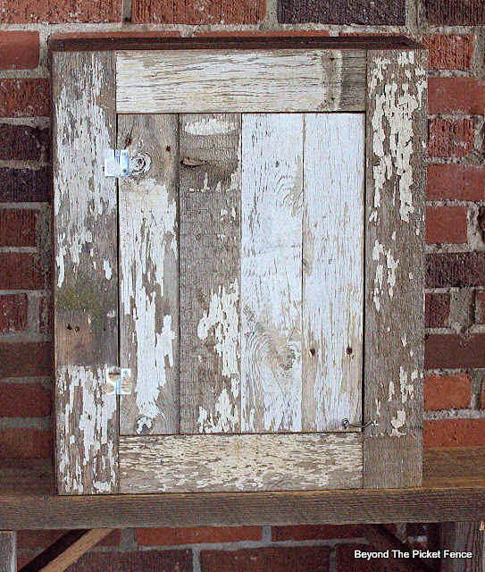 Chippy Wall Cabinet Made from Reclaimed Picket Fencing