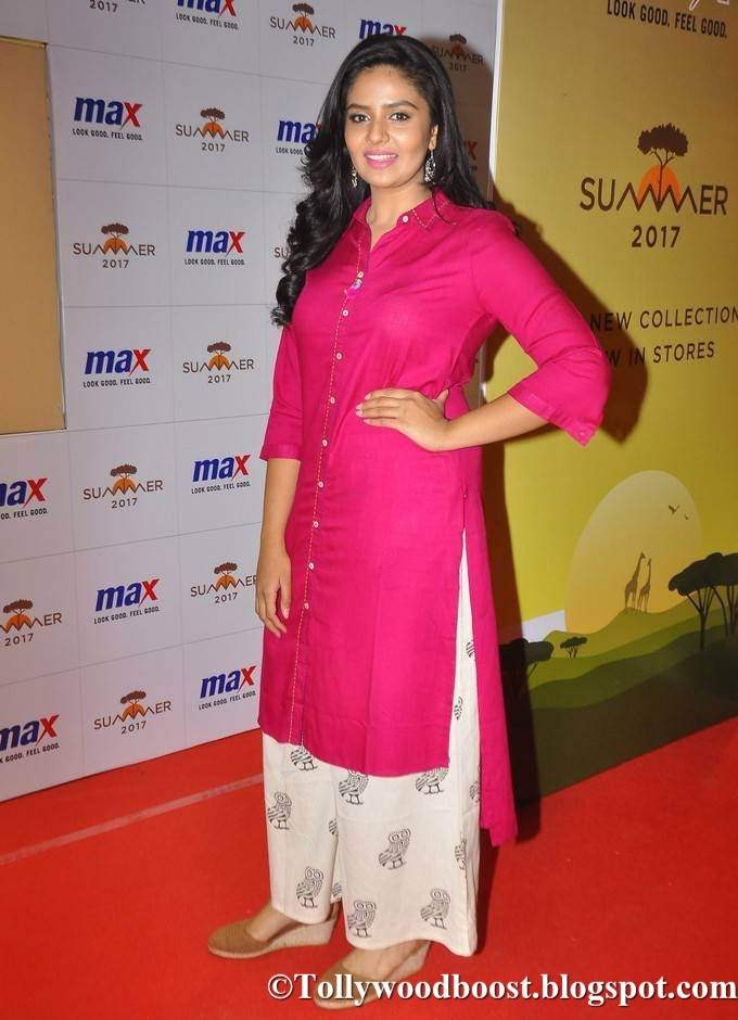 Beautiful Telugu TV Girl Srimukhi Long Hair Stills In Pink Dress