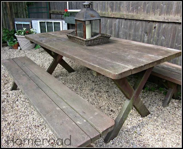 old weathered picnic table with benches