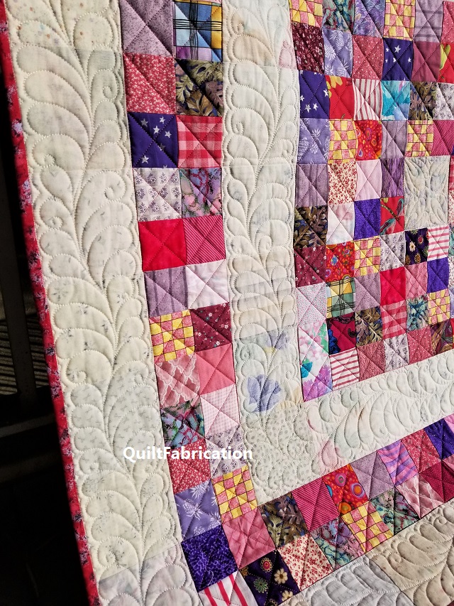 Becharmed scrap quilt by QuiltFabrication