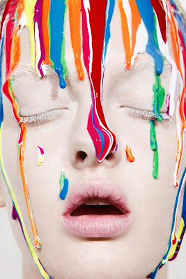 paint dripping down model's face, creative makeup