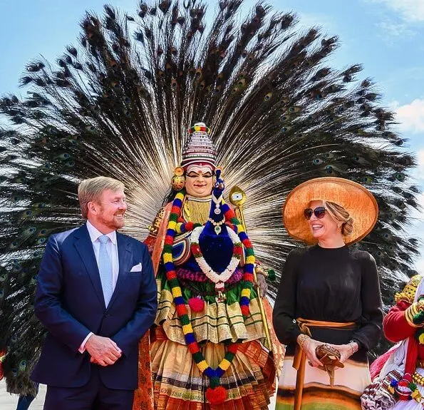 Queen Maxima wore Jan Taminiau short dress. Queen Maxima wore a pattern print silk dress by Jan Taminiau in India