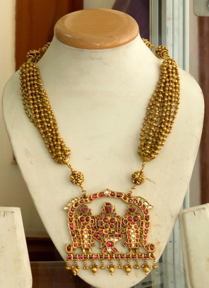 Gold Balls Set with Ruby Locket Jewellery Designs