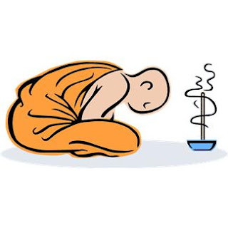 picture of monk burning incense